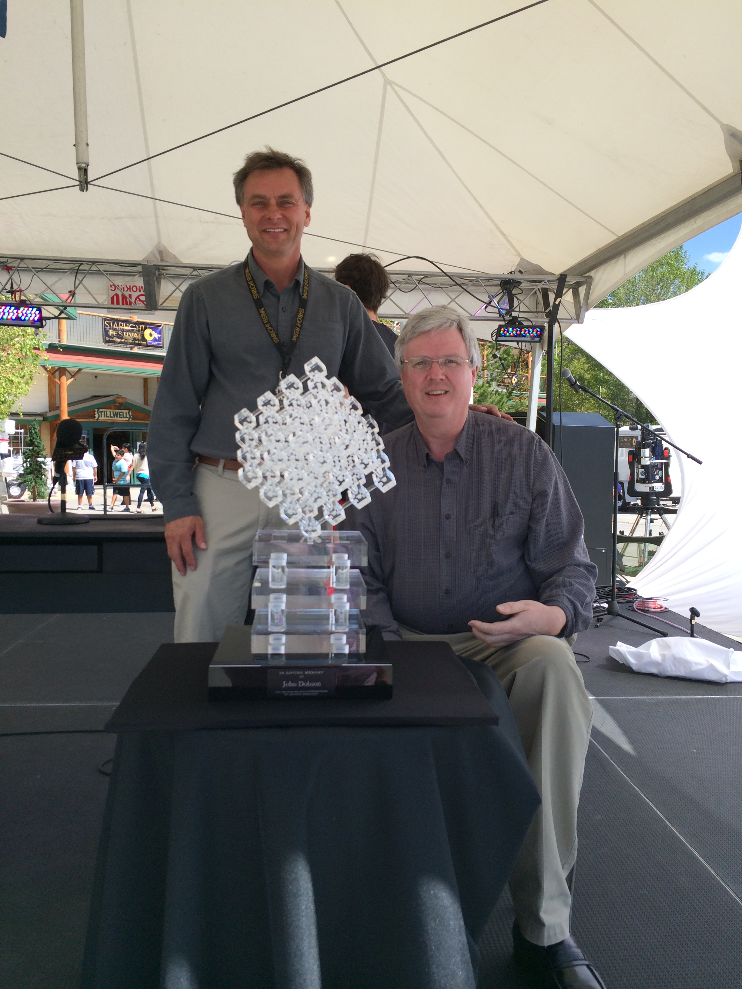 Scott Roberts and Arlen Raasch with Galaxy Sculpture